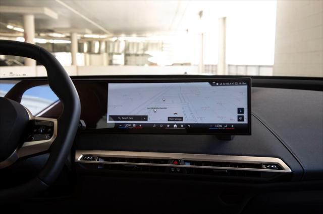 new 2026 BMW iX car, priced at $79,650