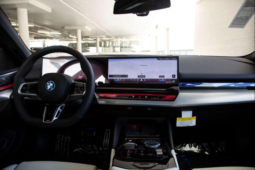 new 2026 BMW 550e car, priced at $83,650