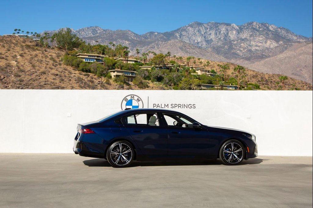 new 2026 BMW 550e car, priced at $83,650