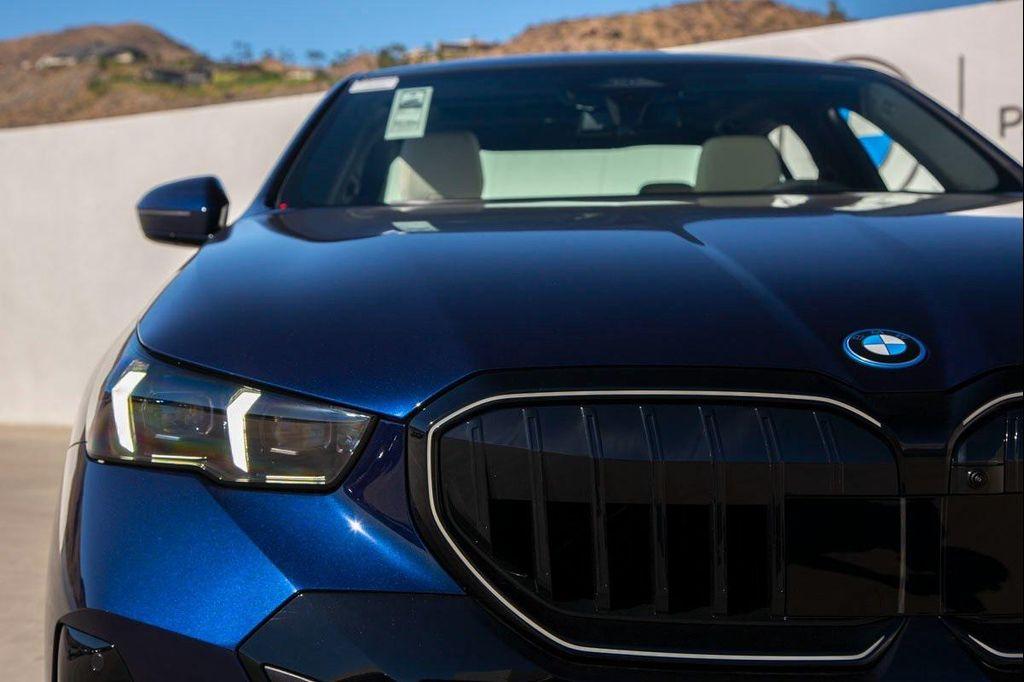 new 2026 BMW 550e car, priced at $83,650