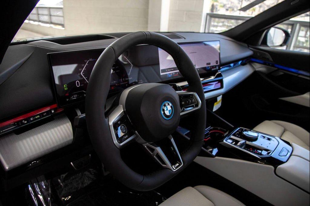 new 2026 BMW 550e car, priced at $83,650