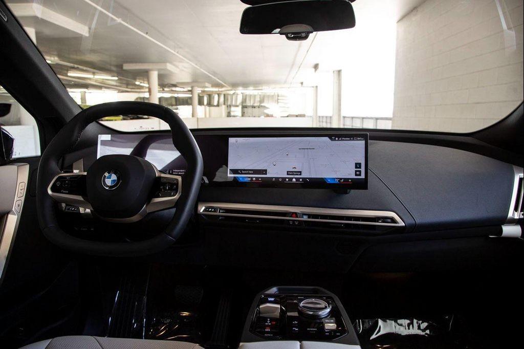 new 2026 BMW iX car, priced at $98,650