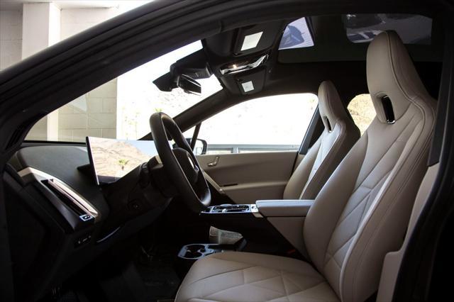 new 2026 BMW iX car, priced at $98,650