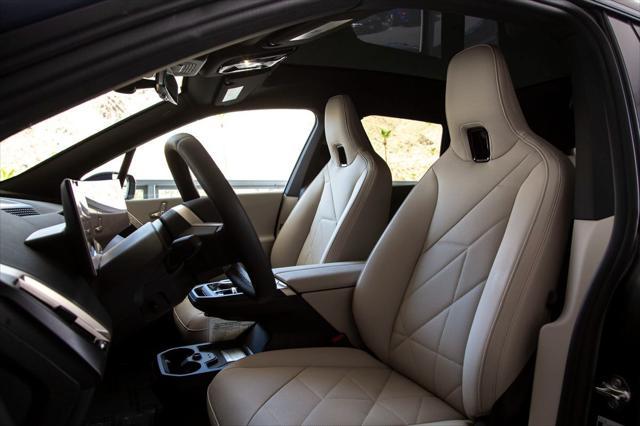 new 2026 BMW iX car, priced at $98,650