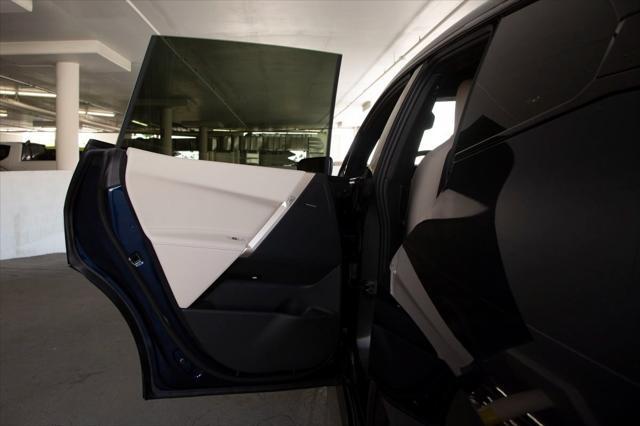 new 2026 BMW iX car, priced at $98,650