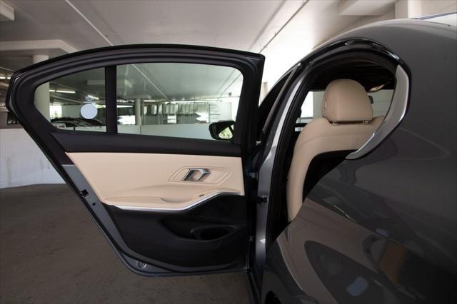 new 2025 BMW 330 car, priced at $50,150