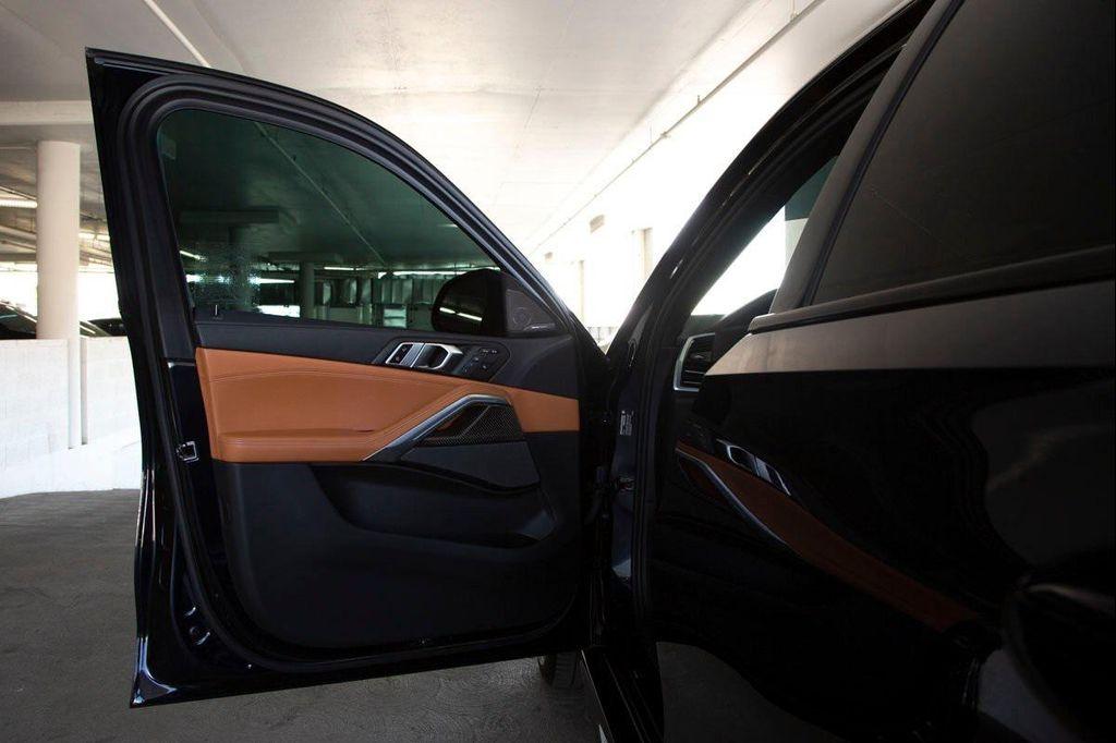 used 2023 BMW X6 car, priced at $68,988