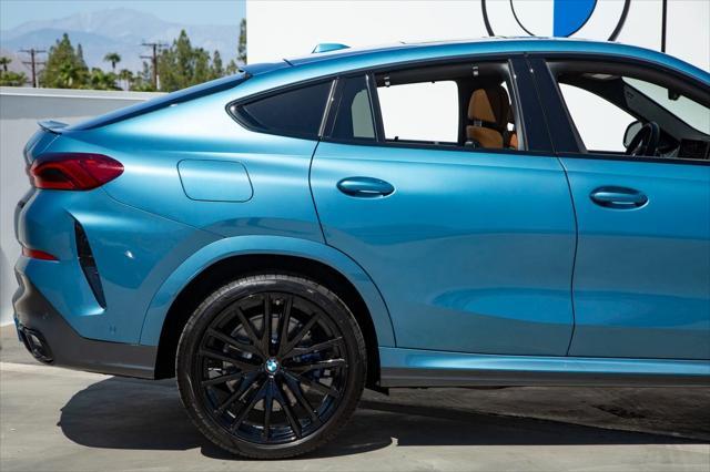 new 2025 BMW X6 car, priced at $111,610