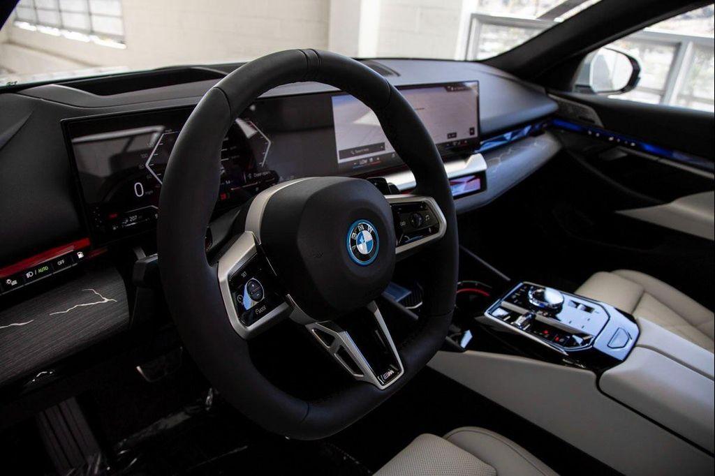 new 2026 BMW 550e car, priced at $88,900