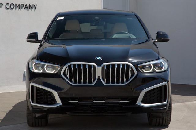 used 2022 BMW X6 car, priced at $58,988