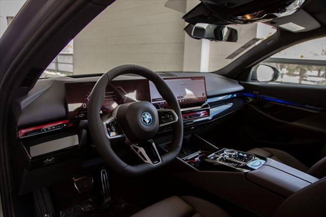 new 2025 BMW 550e car, priced at $82,875
