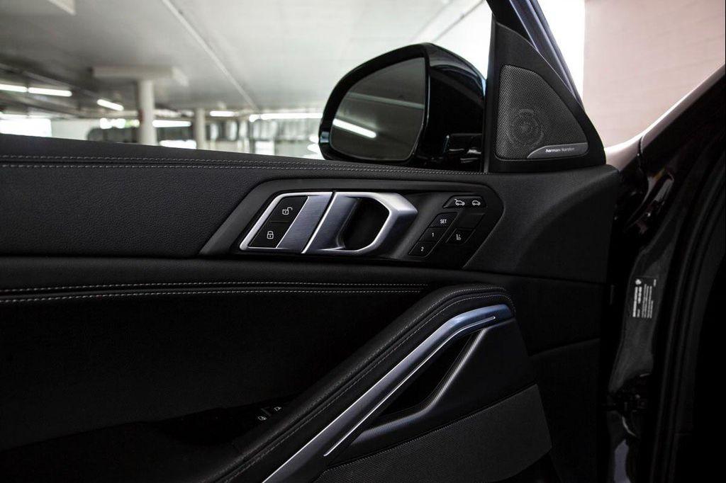 used 2023 BMW X6 car, priced at $58,488