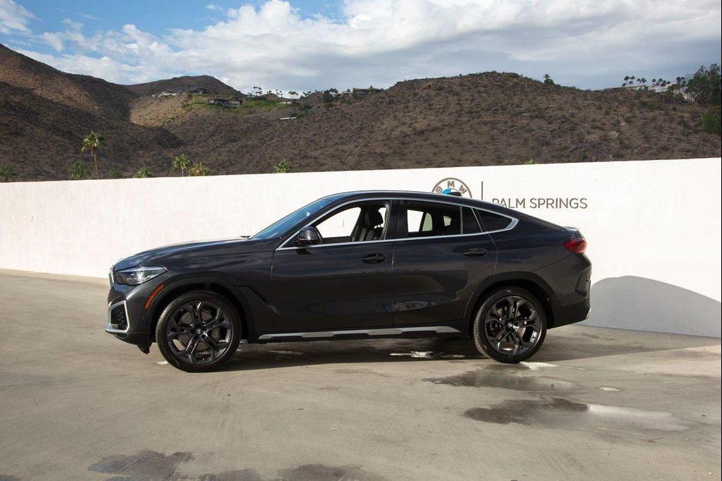 used 2023 BMW X6 car, priced at $58,488