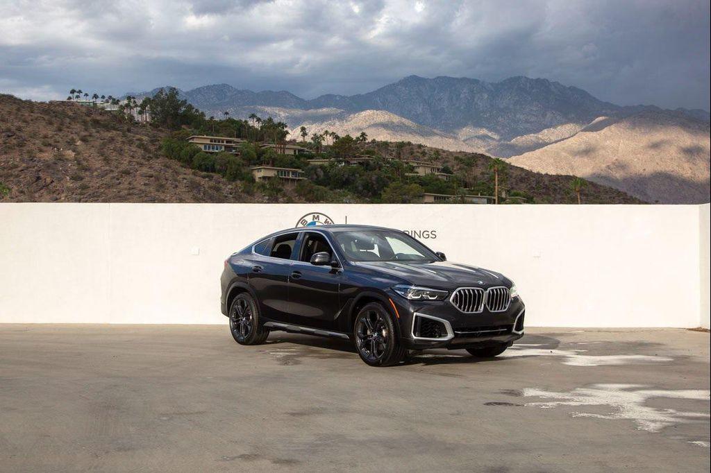 used 2023 BMW X6 car, priced at $58,488