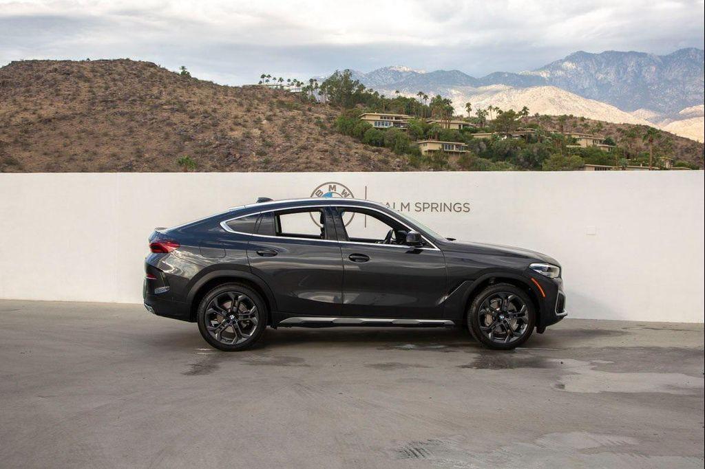 used 2023 BMW X6 car, priced at $58,488
