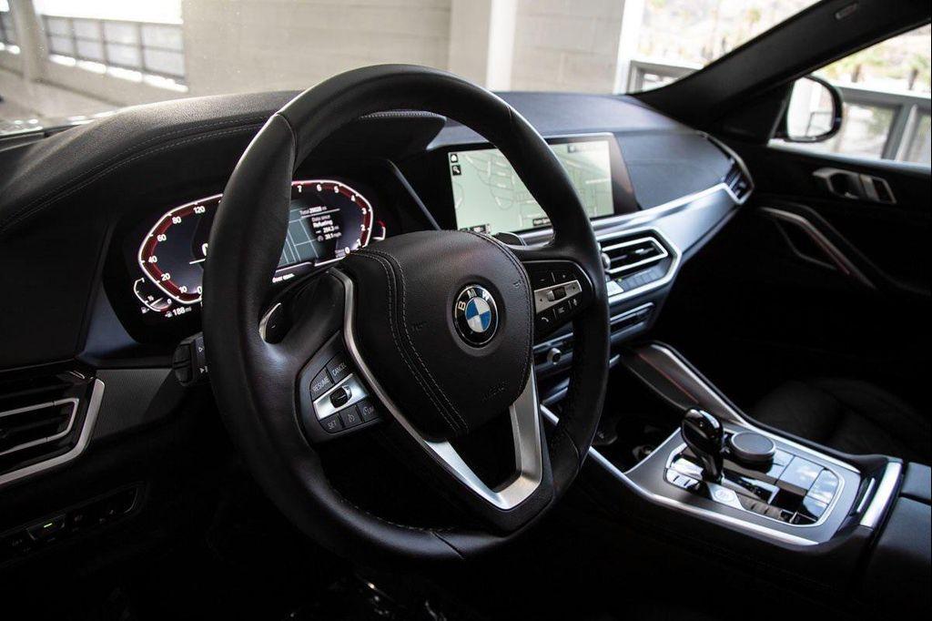 used 2023 BMW X6 car, priced at $58,488