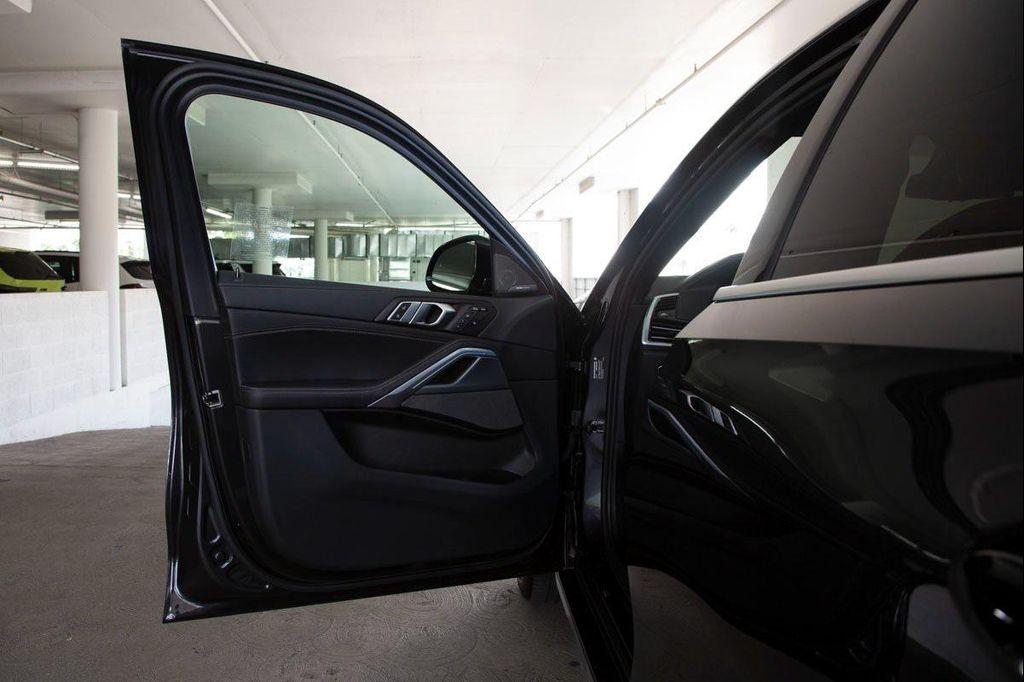 used 2023 BMW X6 car, priced at $58,488