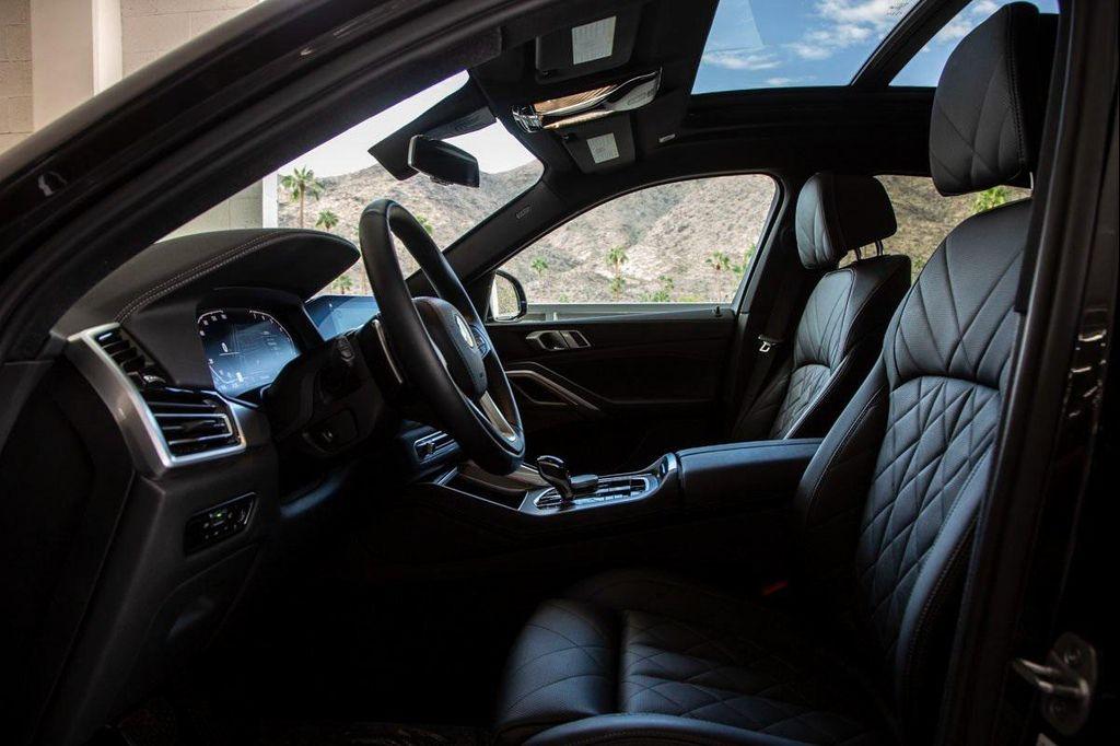 used 2023 BMW X6 car, priced at $58,488