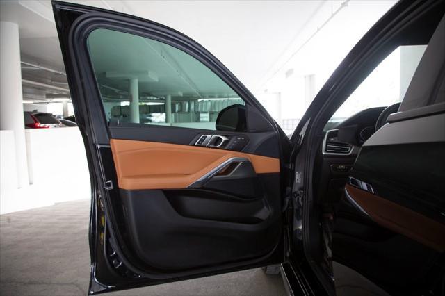 used 2023 BMW X6 car, priced at $59,288