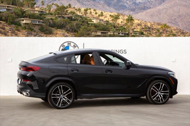 used 2023 BMW X6 car, priced at $59,288