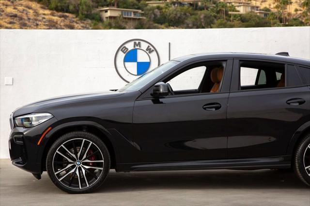 used 2023 BMW X6 car, priced at $59,288