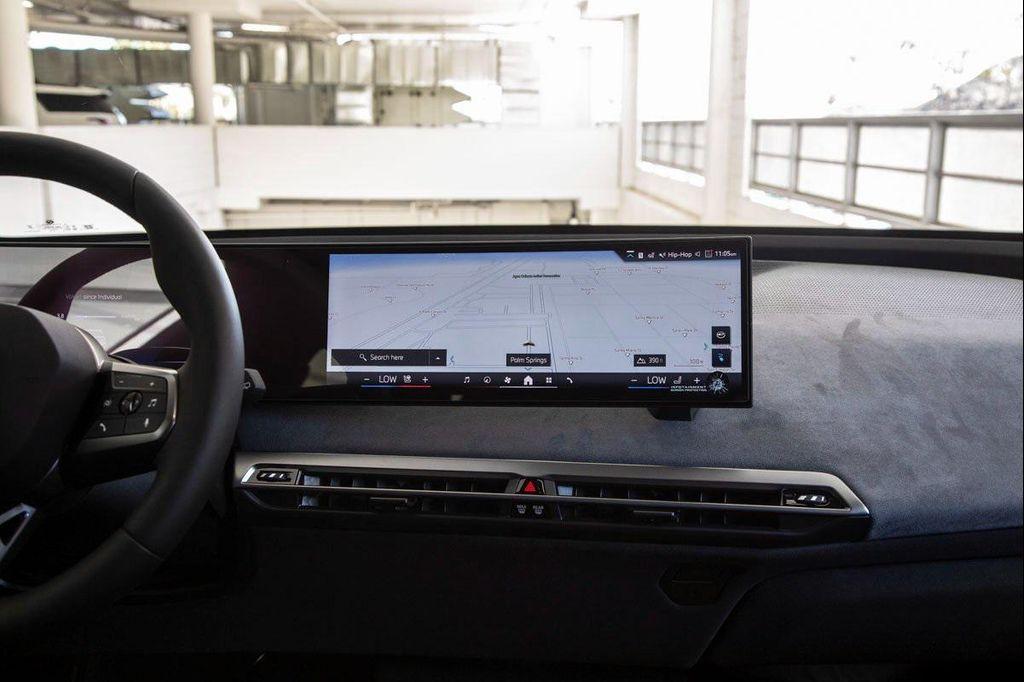 new 2026 BMW iX car, priced at $97,875