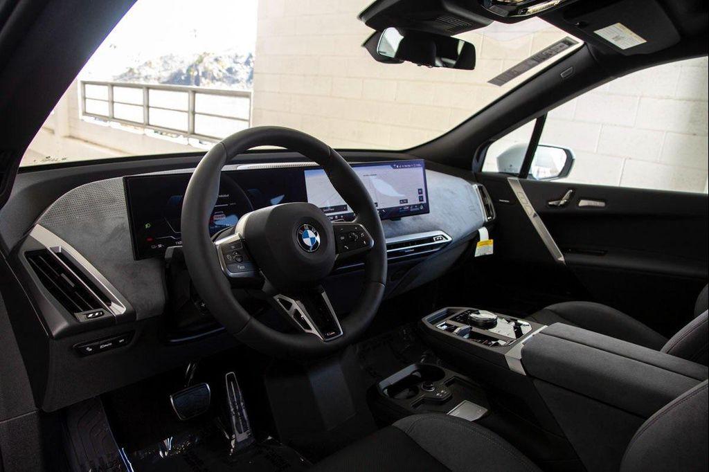 new 2026 BMW iX car, priced at $97,875