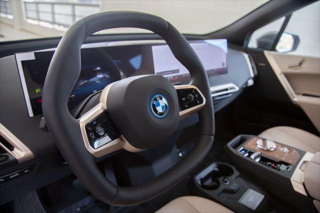 new 2025 BMW iX car, priced at $98,885