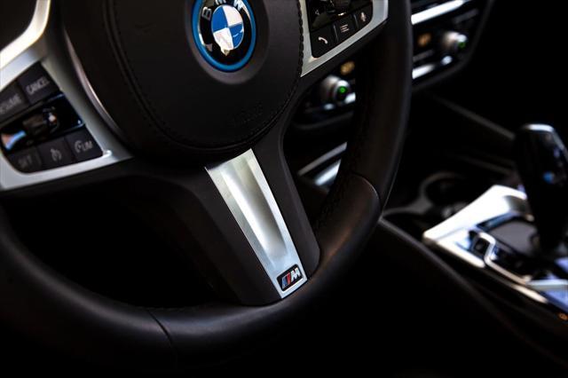 used 2022 BMW 530e car, priced at $36,488