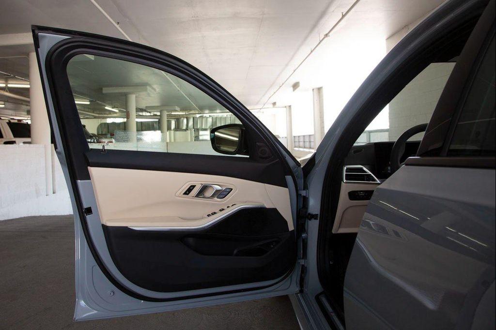 new 2025 BMW 330 car, priced at $53,875