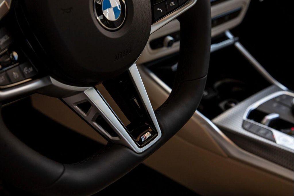 new 2025 BMW 330 car, priced at $53,875