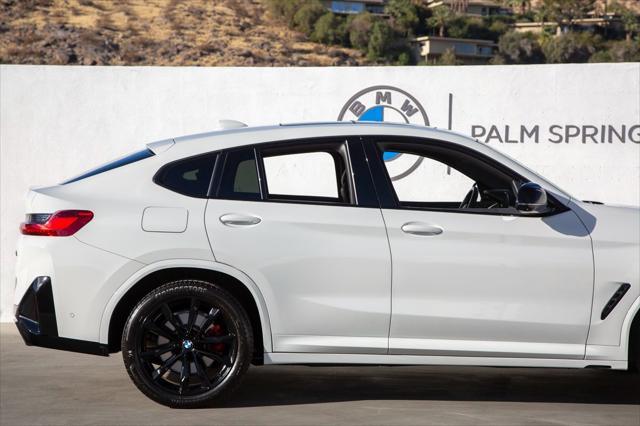 used 2023 BMW X4 car, priced at $57,988