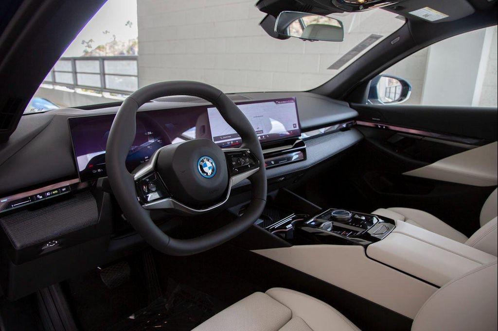 used 2025 BMW i5 car, priced at $63,488