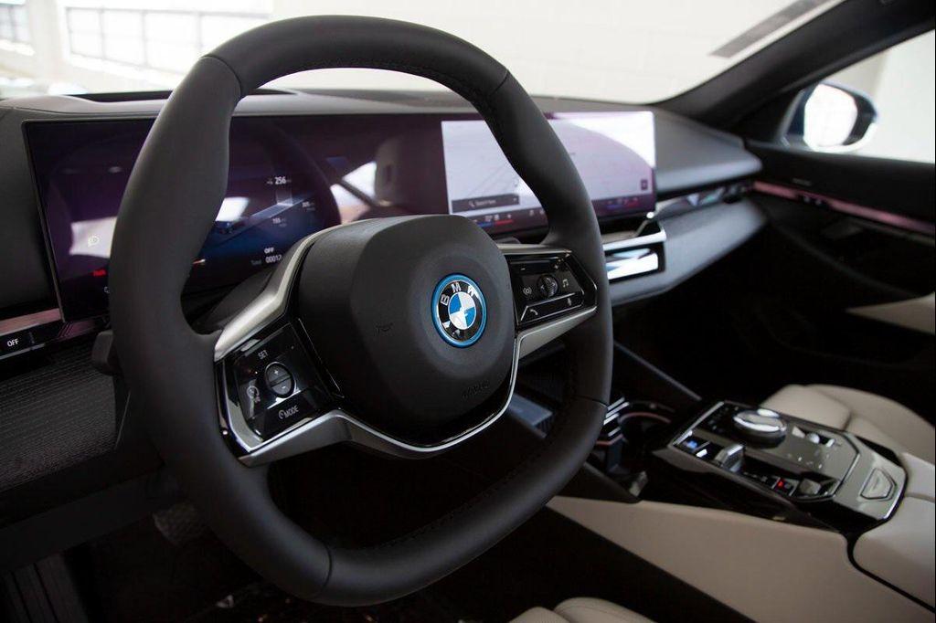 used 2025 BMW i5 car, priced at $63,488