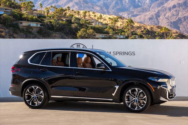 new 2025 BMW X5 PHEV car, priced at $77,085