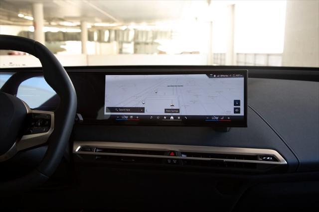 new 2026 BMW iX car, priced at $81,600
