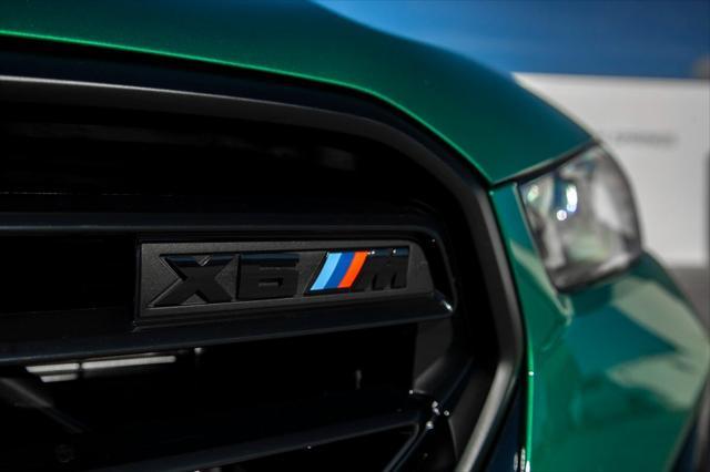 new 2025 BMW X6 M car, priced at $139,850