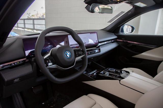 new 2025 BMW i5 car, priced at $73,285