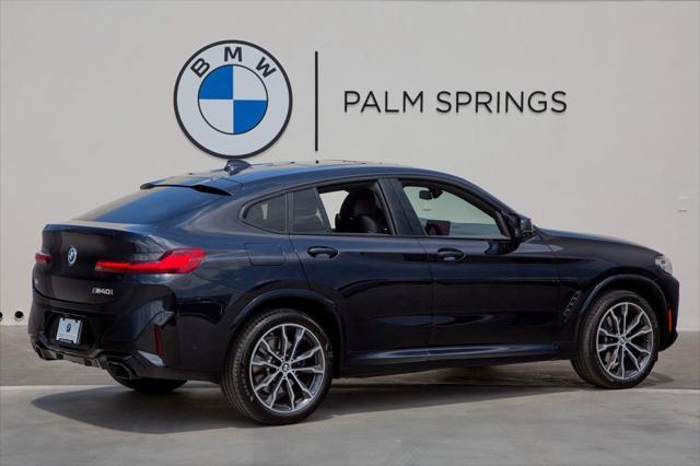 used 2023 BMW X4 car, priced at $55,988