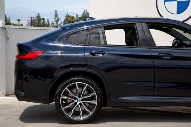 used 2023 BMW X4 car, priced at $55,988