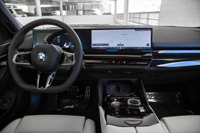 new 2025 BMW 530 car, priced at $70,320