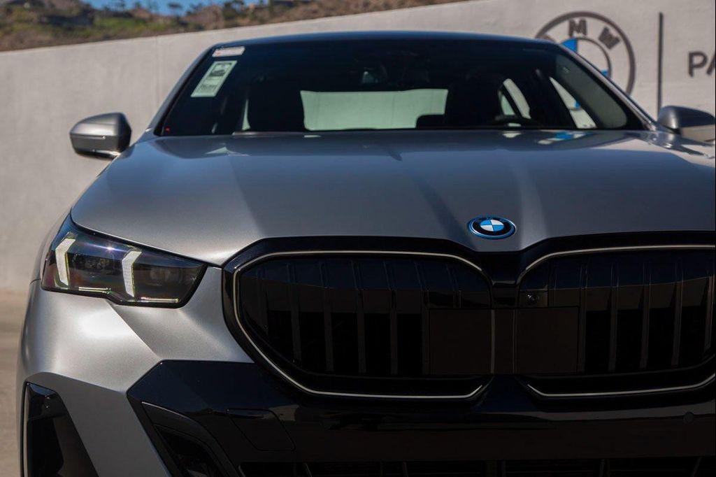 new 2026 BMW 550e car, priced at $87,550