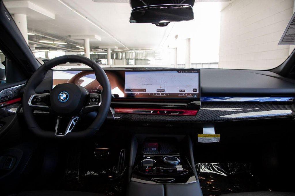 new 2026 BMW 550e car, priced at $87,550
