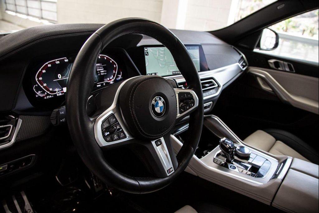 used 2023 BMW X6 car, priced at $62,288