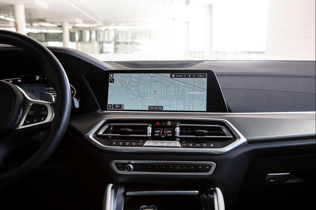 used 2023 BMW X6 car, priced at $62,288