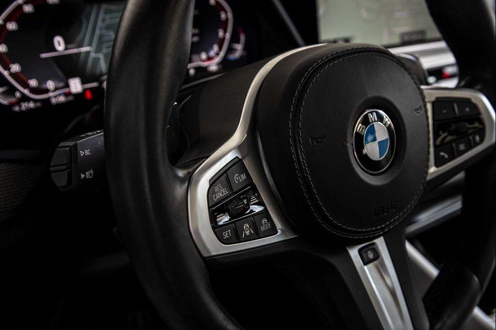 used 2023 BMW X6 car, priced at $62,288