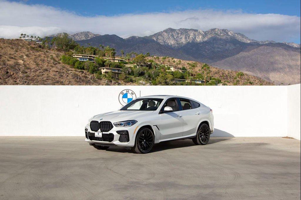 used 2023 BMW X6 car, priced at $62,288