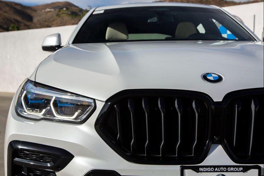 used 2023 BMW X6 car, priced at $62,288