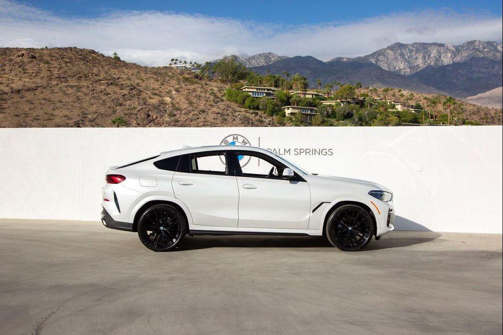 used 2023 BMW X6 car, priced at $62,288