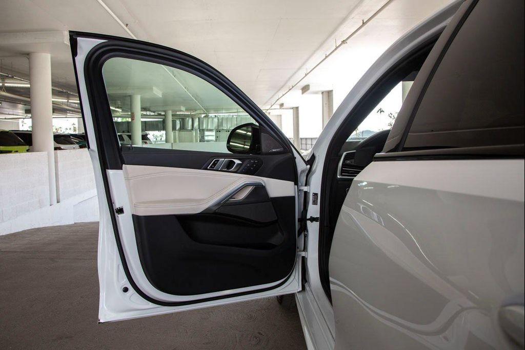 used 2023 BMW X6 car, priced at $62,288